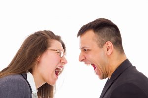 man and woman with love problems yelling at each other