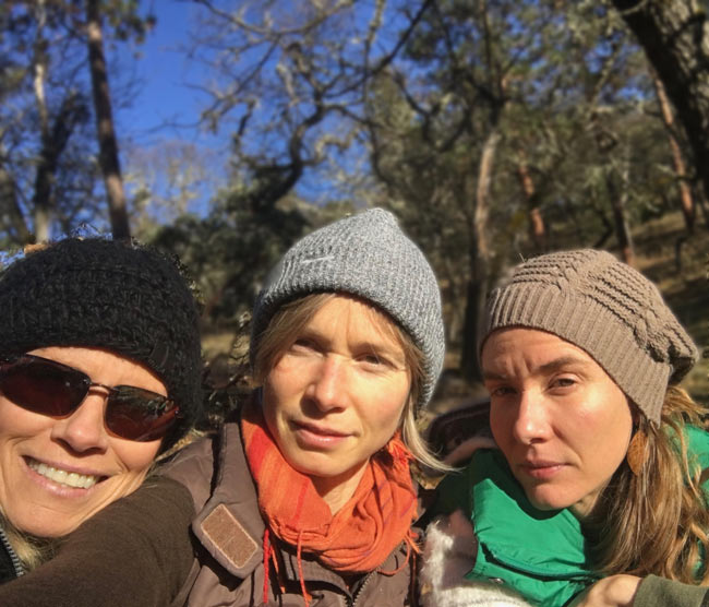 Debra Beck with her daughters outdoors during a mother-daughter retreat in Sedona