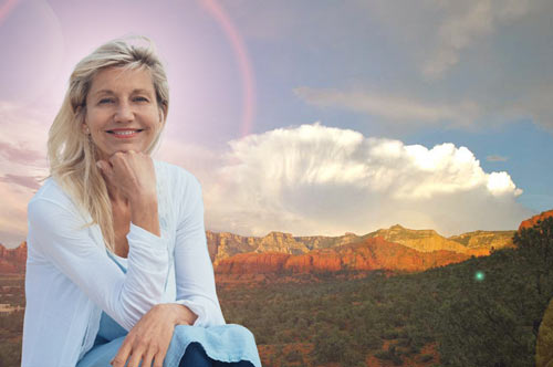 Woman smiling peacefully outdoors during a Sedona individual healing retreat for women